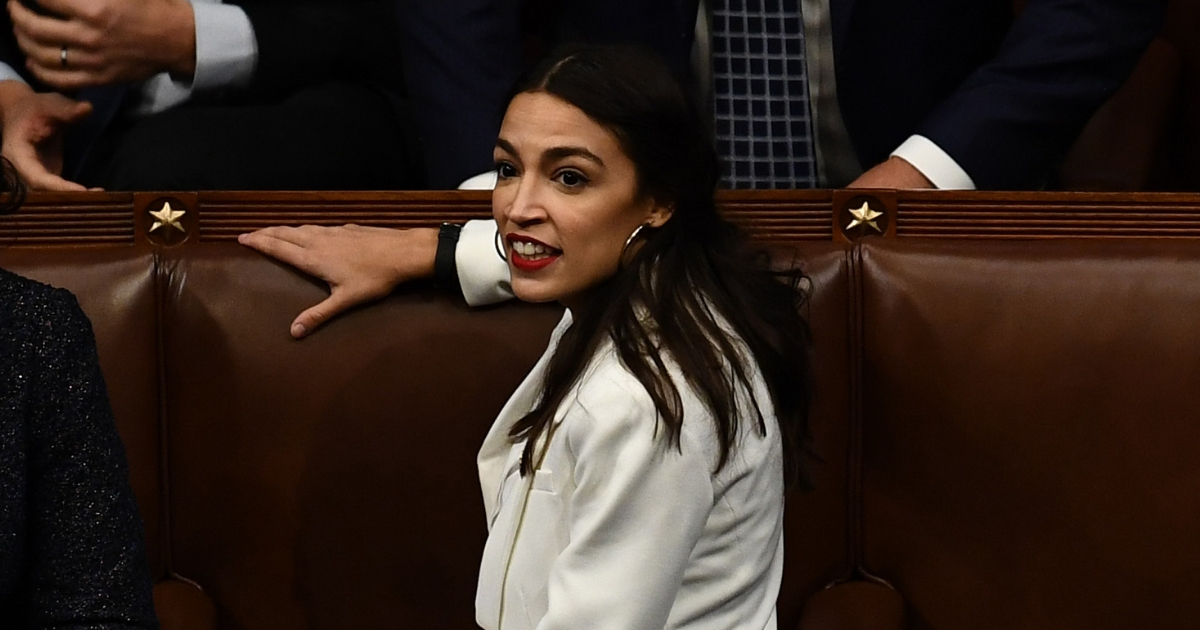Rep. Alexandria Ocasio-Cortez awaits the start of the 116th Congress on the floor of the U.S. House of Representatives at the U.S. Capitol on Jan. 3, 2019, in Washington, D.C.