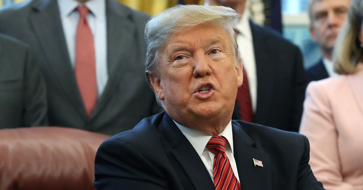 President Donald Trump speaks to the media after signing Anti-Human Trafficking Legislation in the Oval Office on Jan. 9, 2019, in Washington, D.C.