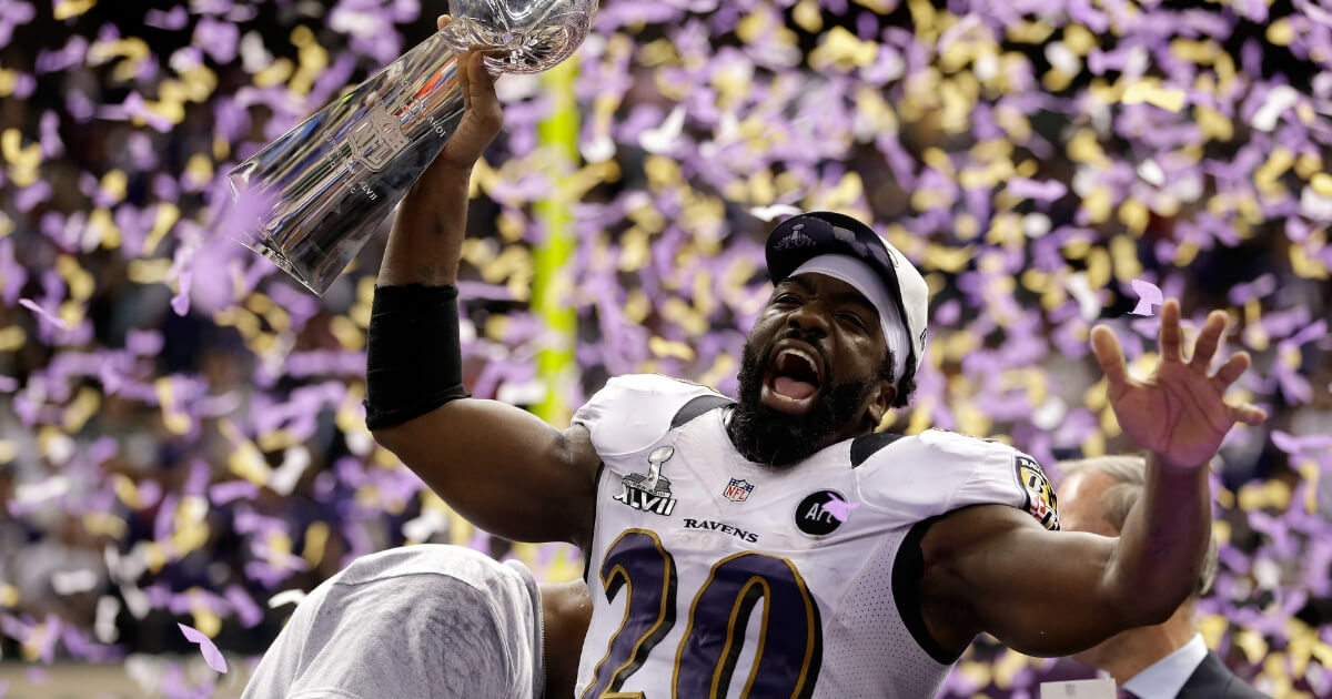 Safety Ed Reed celebrates with the VInce Lombardi Trophy after the Baltimore Ravens beat the San Francisco 49ers in Super Bowl XLVII at the Mercedes-Benz Superdome in New Orleans on Feb. 3, 2013.