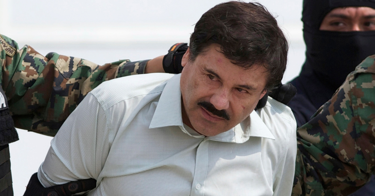 Joaquin "El Chapo" Guzman, the head of Mexico’s Sinaloa Cartel, is escorted to a helicopter in Mexico City following his capture in 2014.