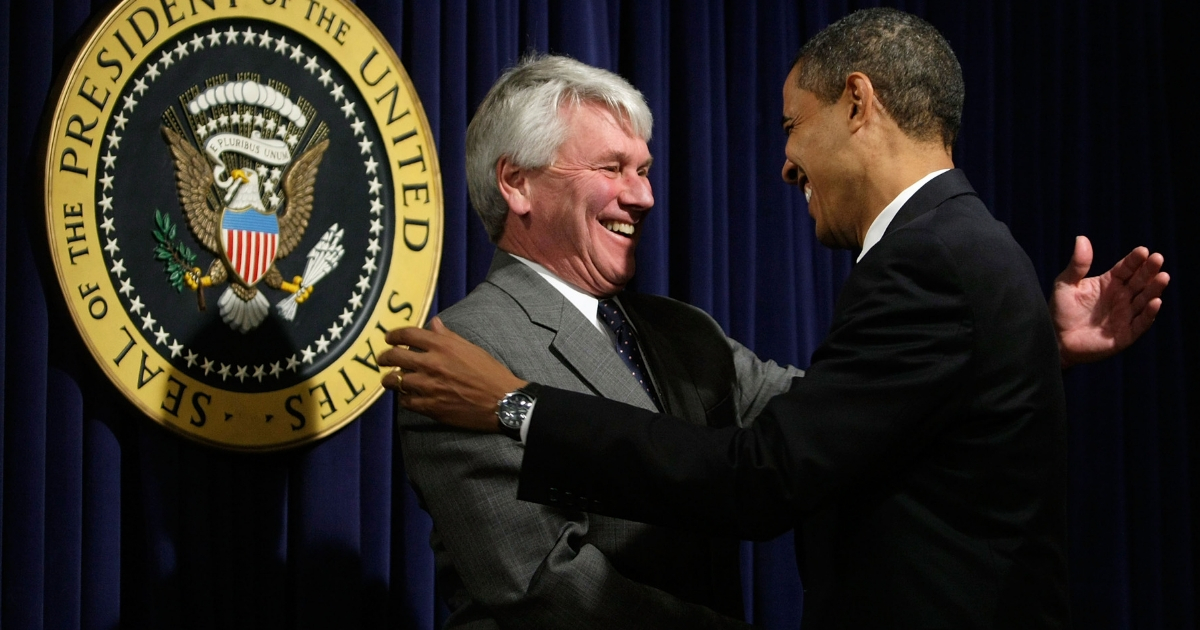 President Barack Obama (Right) greets White House counsel Gregory Craig (Left) during an event at the Eisenhower Executive Office Building of the White House Jan. 21, 2009.
