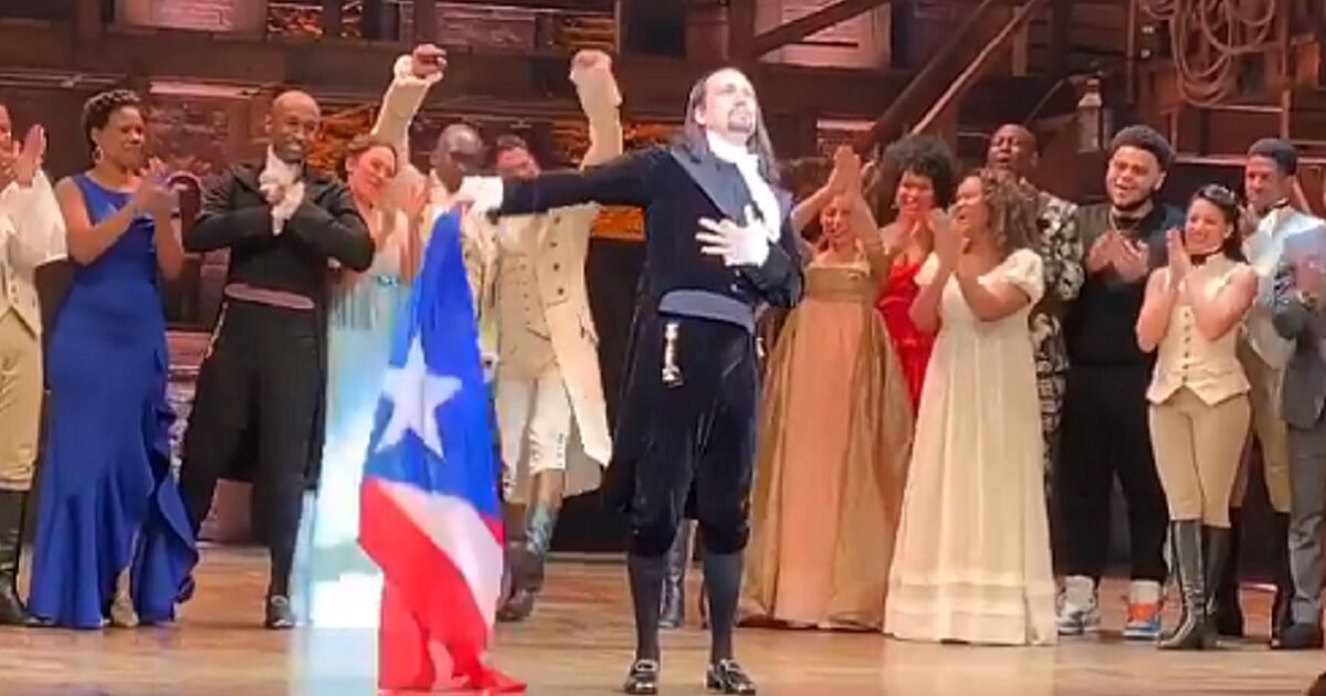 "Hamilton" creator Lin-Manuel Miranda soaks up applause Thursday after a showing of the hit musical in San Juan, Puerto Rico.