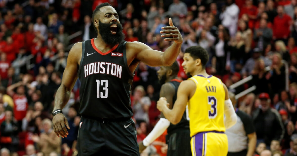 James Harden #13 of the Houston Rockets reacts in overtime against the Los Angeles Lakers at Toyota Center on Saturday in Houston, Texas.