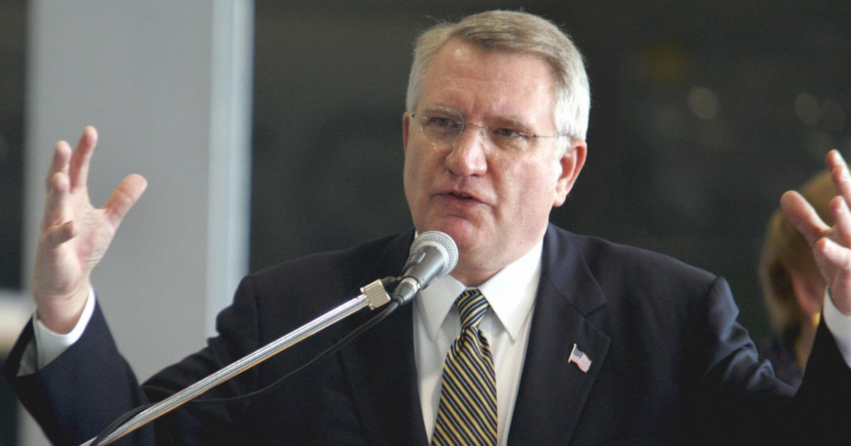John P. Walters, Director U.S. Office of National Drug Control Policy, speaks during the U.S. donation ceremony to Colombian anti-narcotic Police of a hangar, at the Guaymaral Air Force base, near Bogota November 2005.