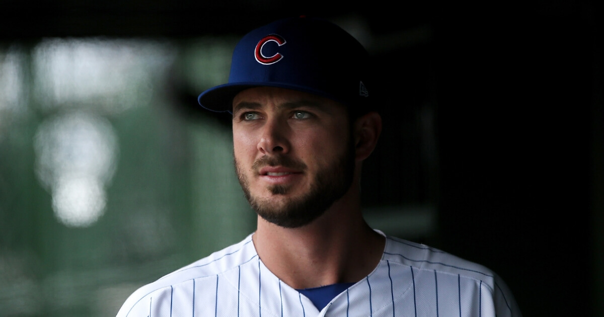 Kris Bryant of the Chicago Cubs stands in the dugout before a May 12, 2018, game against the Chicago White Sox at Wrigley Field.