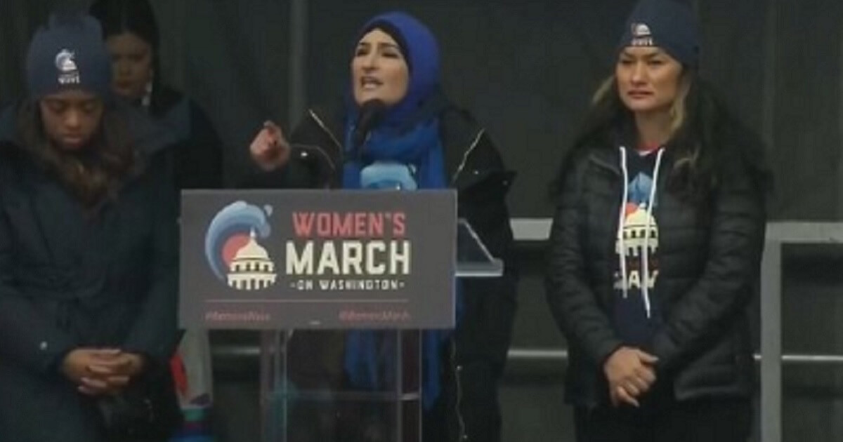 Women's March leader Linda Sarsour addresses the rally Saturday in Washington.