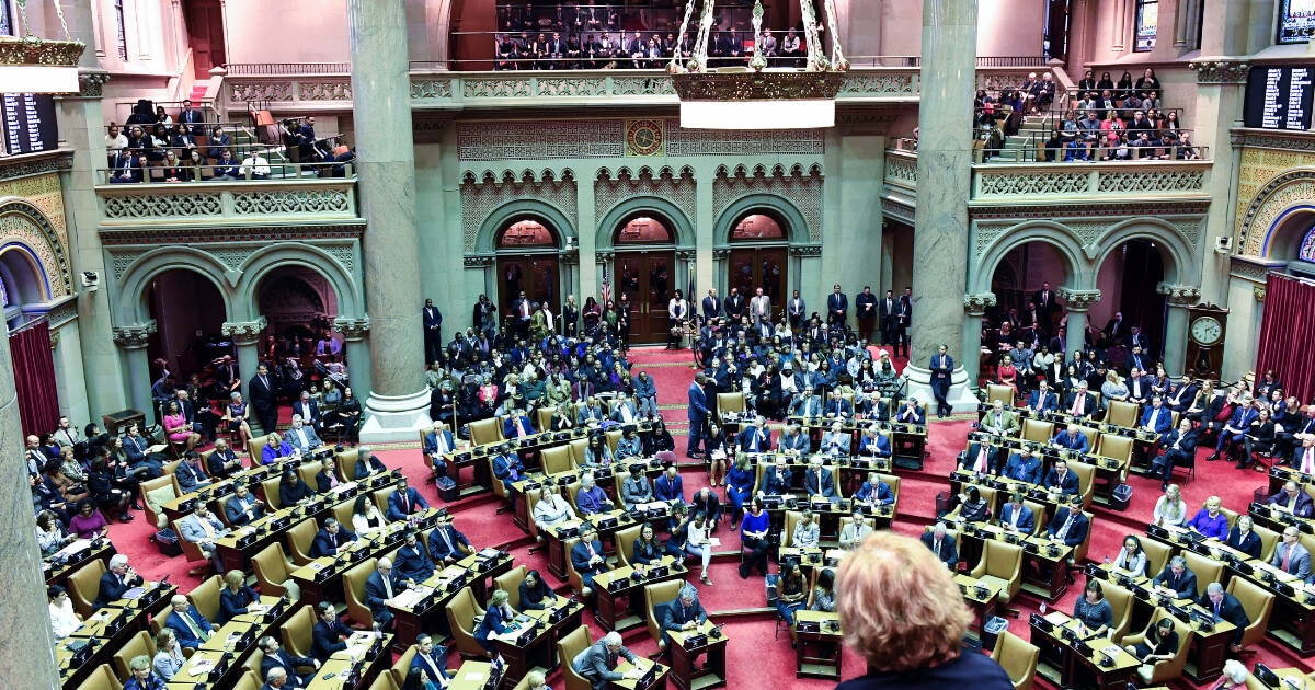 New York Assembly members meet in the Assembly Chamber on the opening day of the legislative session at the state Capitol in Albany on Jan. 9.