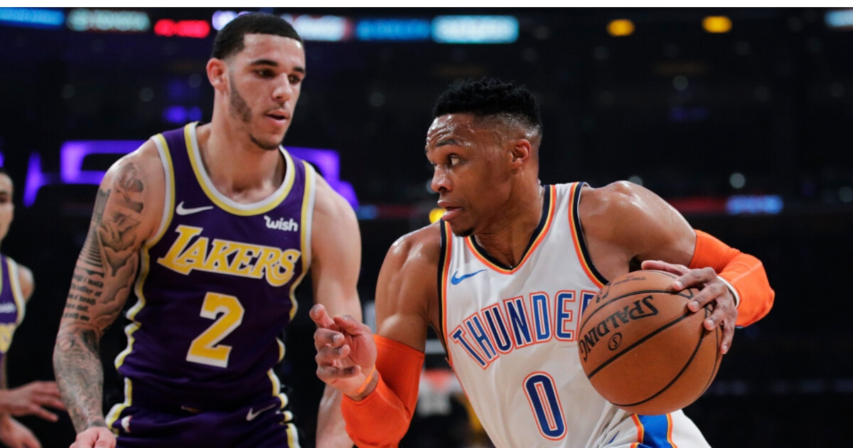 Oklahoma City Thunder's Russell Westbrook drives past Los Angeles Lakers' Lonzo Ball during the first half of an NBA basketball game, Jan. 2, 2019, in Los Angeles.