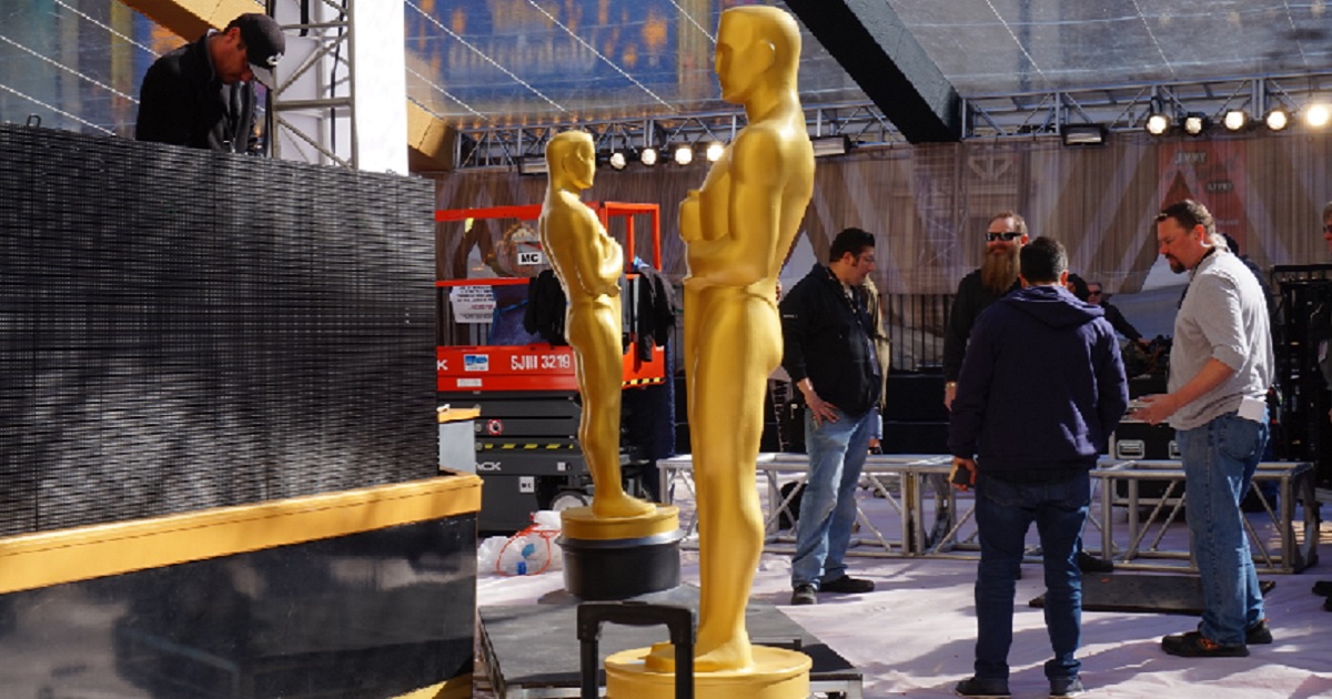 Two large Oscars statues are prepared for the 2017 Academy Awards ceremony.