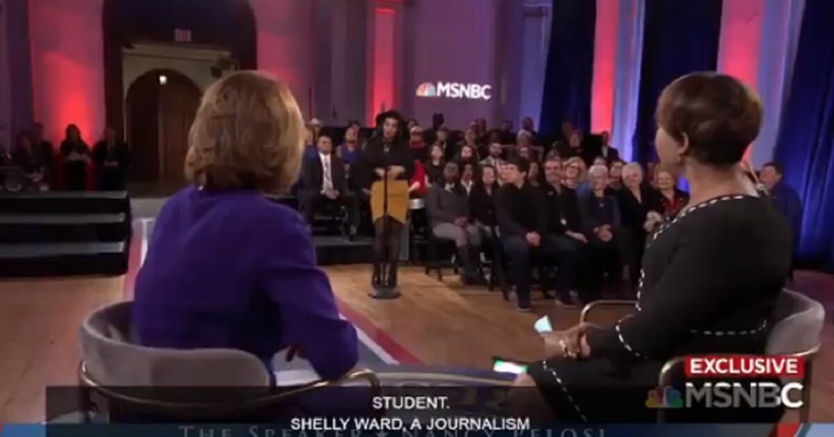 Nancy Pelosi faces a young woman asking a question.