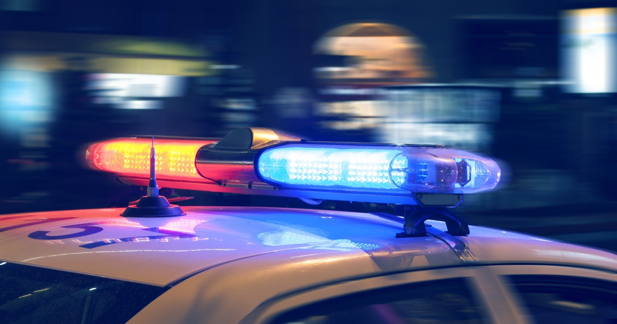 Police car on the street at night