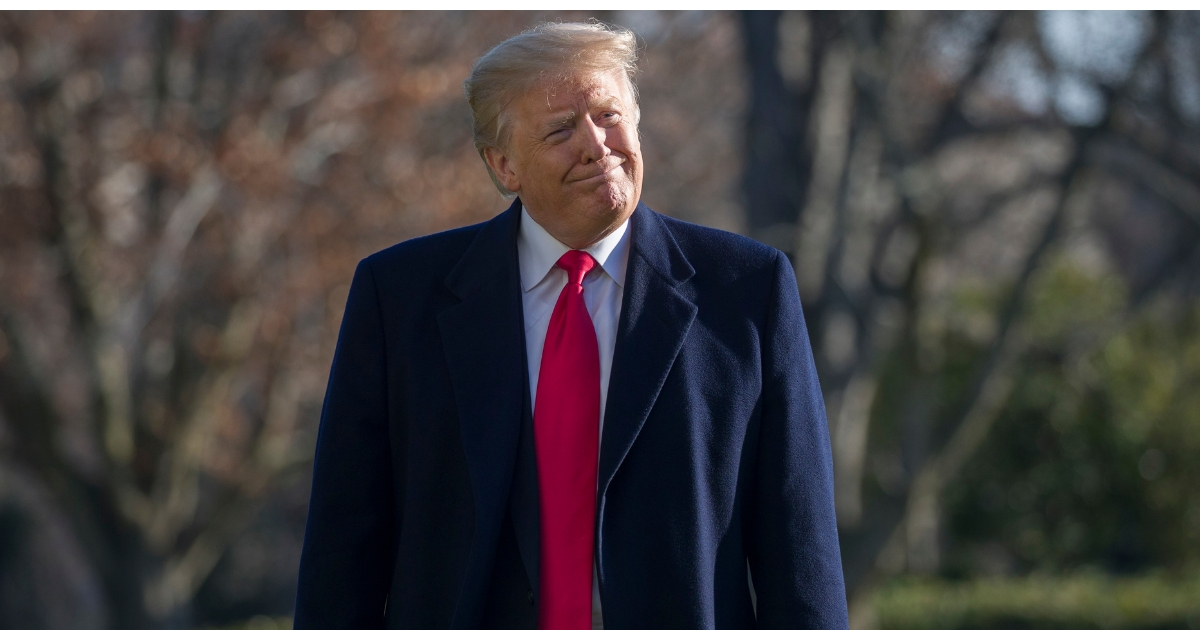 President Donald Trump smiles as he walks on the South Lawn of the White House after stepping off Marine One, Jan. 6, 2019, in Washington.