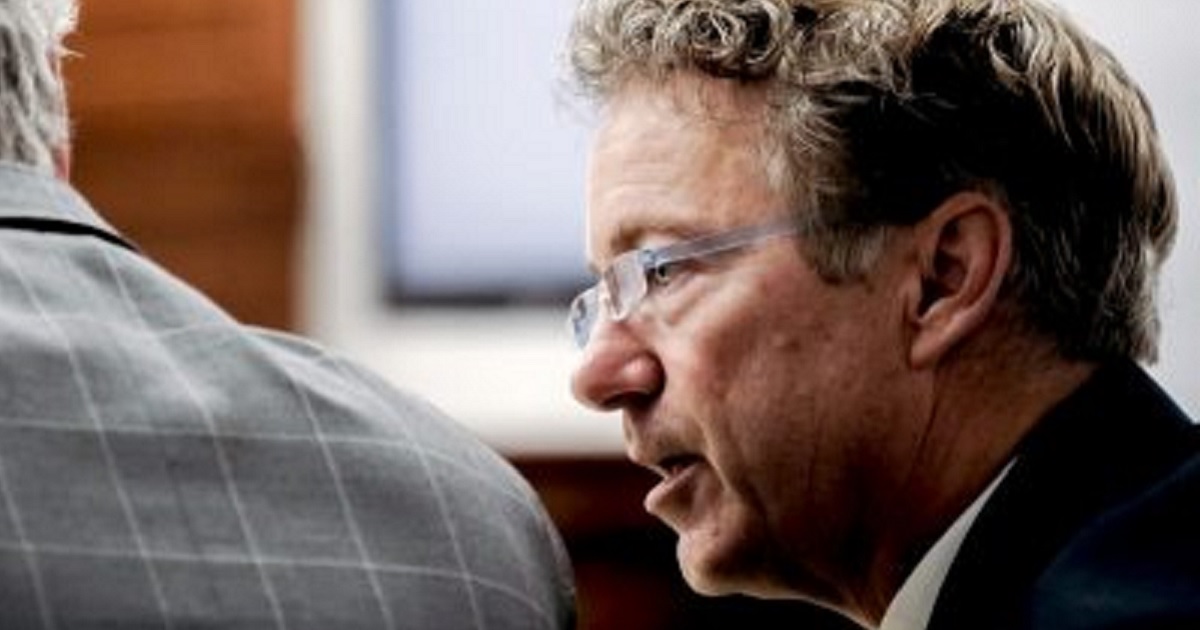 U.S. Sen. Rand Paul talks with his attorney Tom Kerrick on Tuesday during the second day of a civil trial involving Paul and his neighbor Rene Boucher in Warren Circuit Court in Bowling Green, Kentucky.