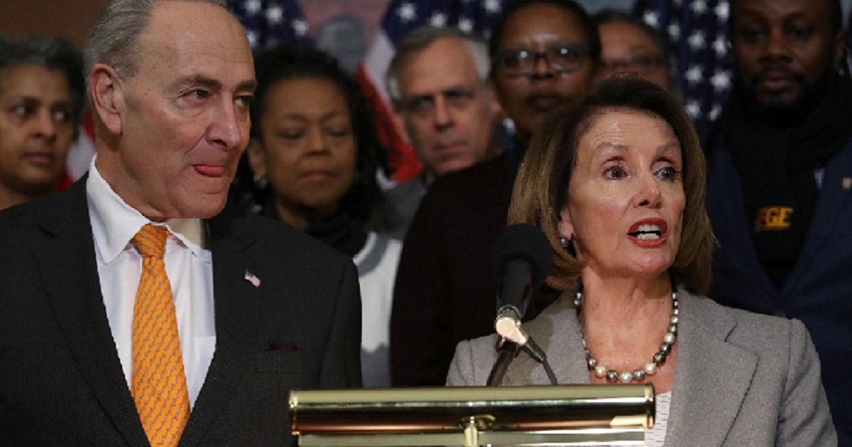 Senate Minority Leader Chuck Schumer and House Speaker Nancy Pelosi participate in a Jan. 9 news conference on Capitol Hill.