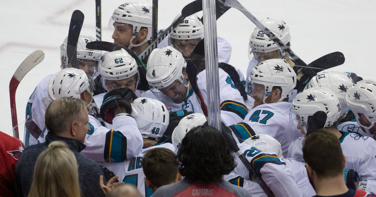 San Jose Sharks center Tomas Hertl (48) celebrates his game-winning goal for a hat trick with his teammates Tuesday in Washington.