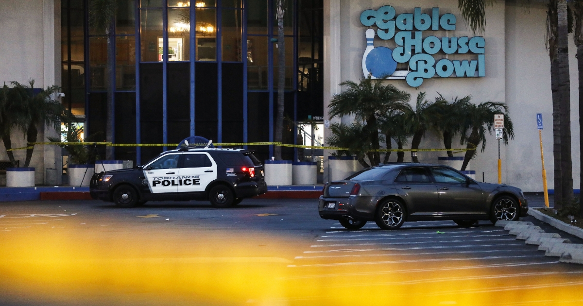 Police investigate the scene of a shooting that left three men dead and four injured at Gable House Bowl on Jan. 5, 2019 in Torrance, California
