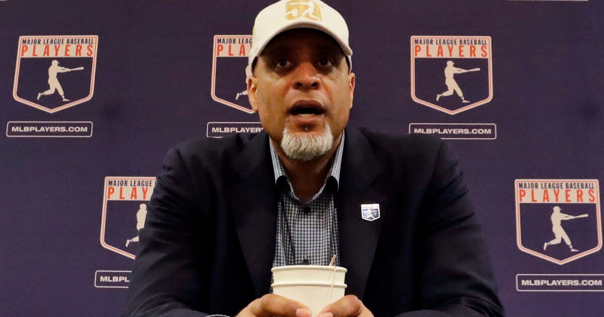 Tony Clark, executive director of the Major League Players Association, answers questions at a news conference in Phoenix on Feb. 19, 2017.