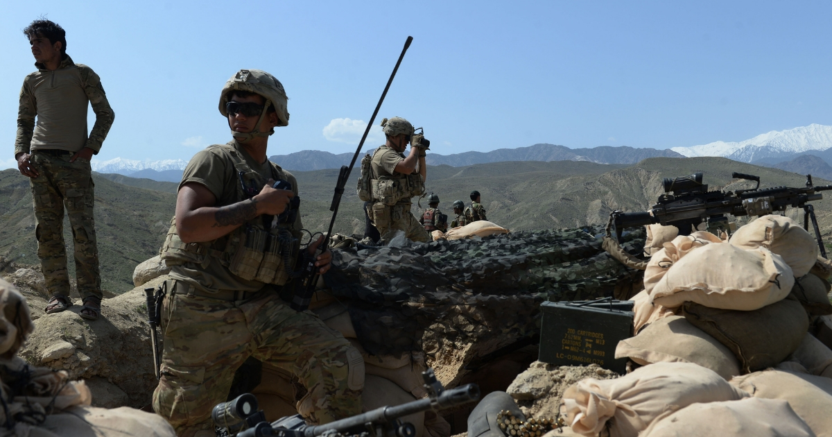 In this photograph taken on April 11, 2017, U.S. soldiers take up positions during an ongoing an operation against Islamic State militants in the Achin district of Afghanistan's Nangarhar province.