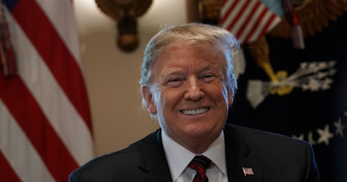 Trump smiling