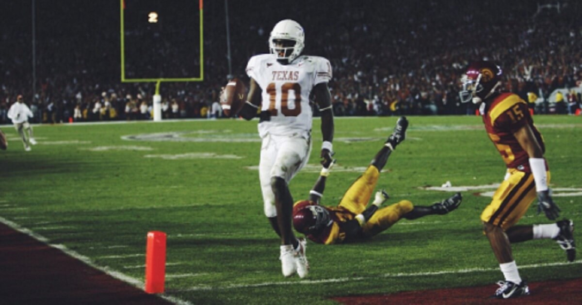 Then-Texas Longhorns quarterback Vince Young scores the winning touchdown in the final seconds of the 2006 Rose Bowl.