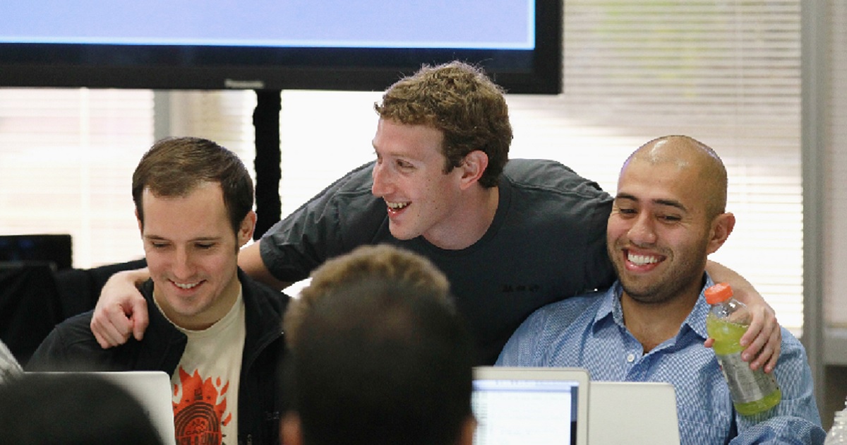 Mark Zuckerberg pictured with Facebook employees in a 2010 file photo.