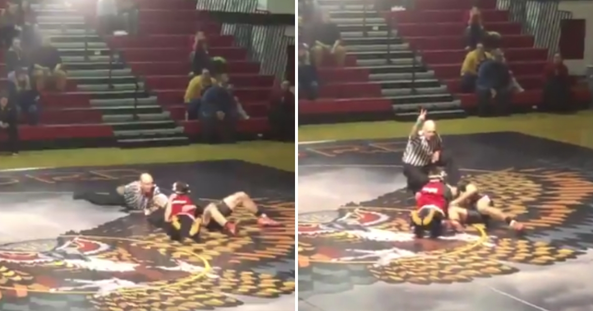 A boy with cerebral palsy wrestles.