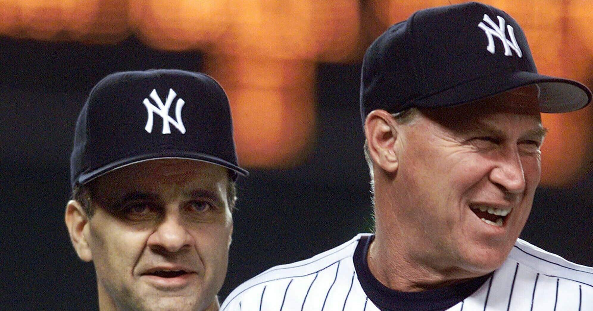 In a Aug. 27, 1999, file photo, New York Yankees manager Joe Torre, left, and pitching coach Mel Stottlemyre head onto the field to congratulate their players after the Yankees defeated the Seattle Mariners 8-0 in New York.