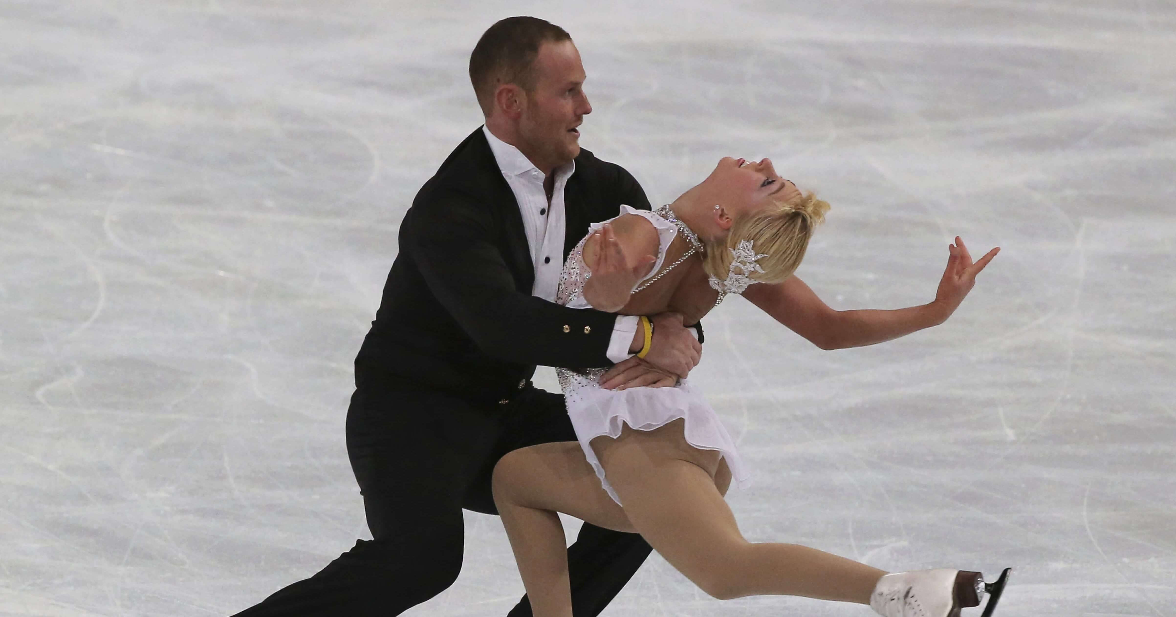 Caydee Denney and John Coughlin perform in the pairs free skate at the ISU Figure Skating Eric Bompard Trophy on Nov. 16, 2013, at Bercy arena in Paris.