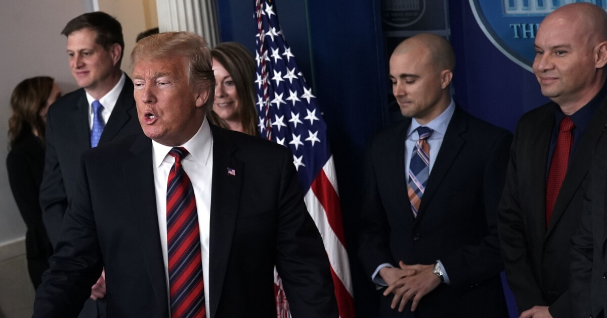 President Donald Trump speaks during a surprise visit to the James Brady Press Briefing Room of the White House with representatives of National Border Patrol Council on day 13 of a partial government shutdown.