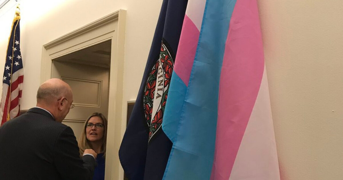 flags outside Rep. Jennifer Wexton's office