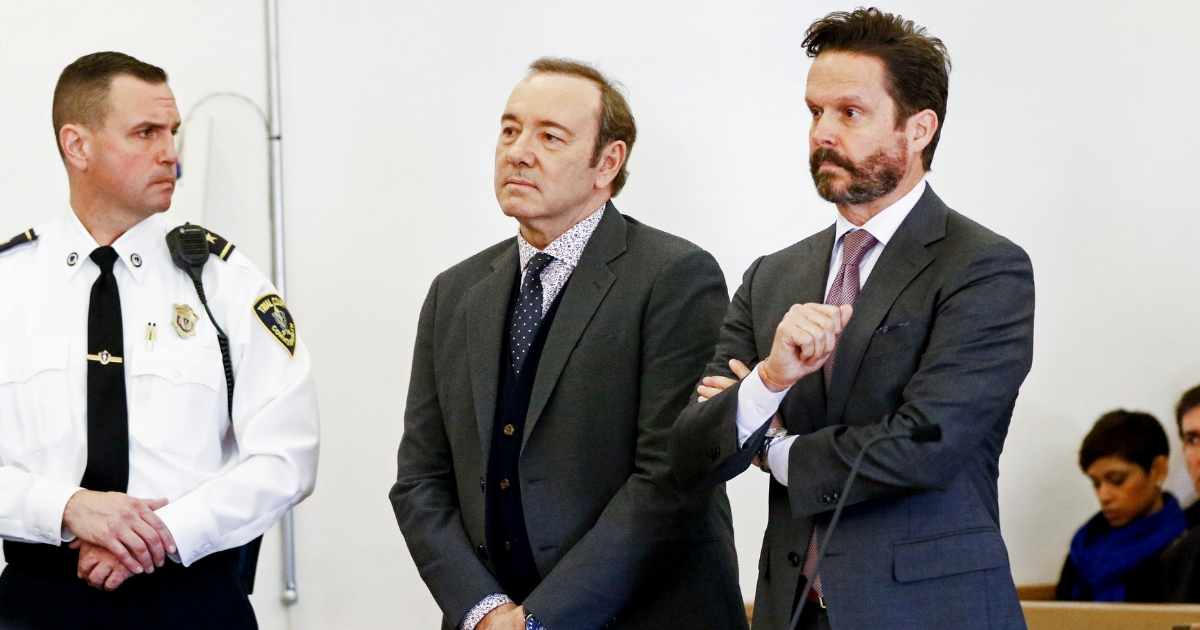Actor Kevin Spacey attends his arraignment on sexual assault charges with his lawyer Alan Jackson.