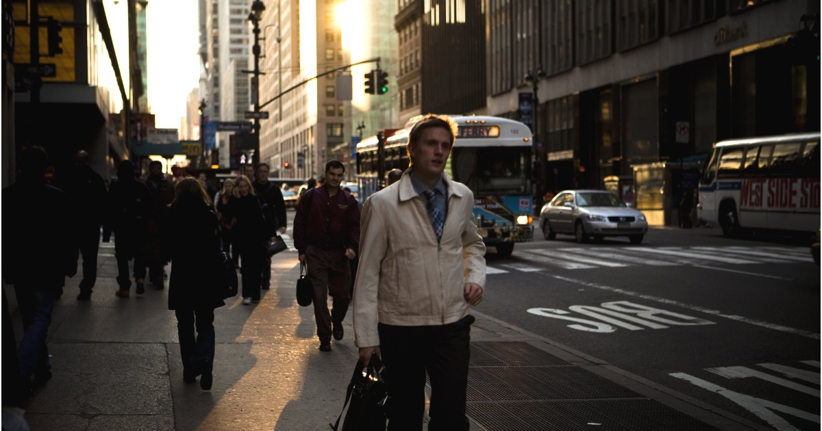 Pedestrians travel the streets during the late afternoon rush hour in Midtown Manhattan.