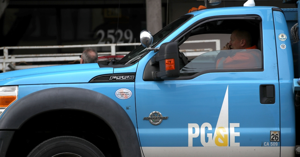 he Pacific Gas & Electric (PG&E) logo is displayed on a PG&E truck.
