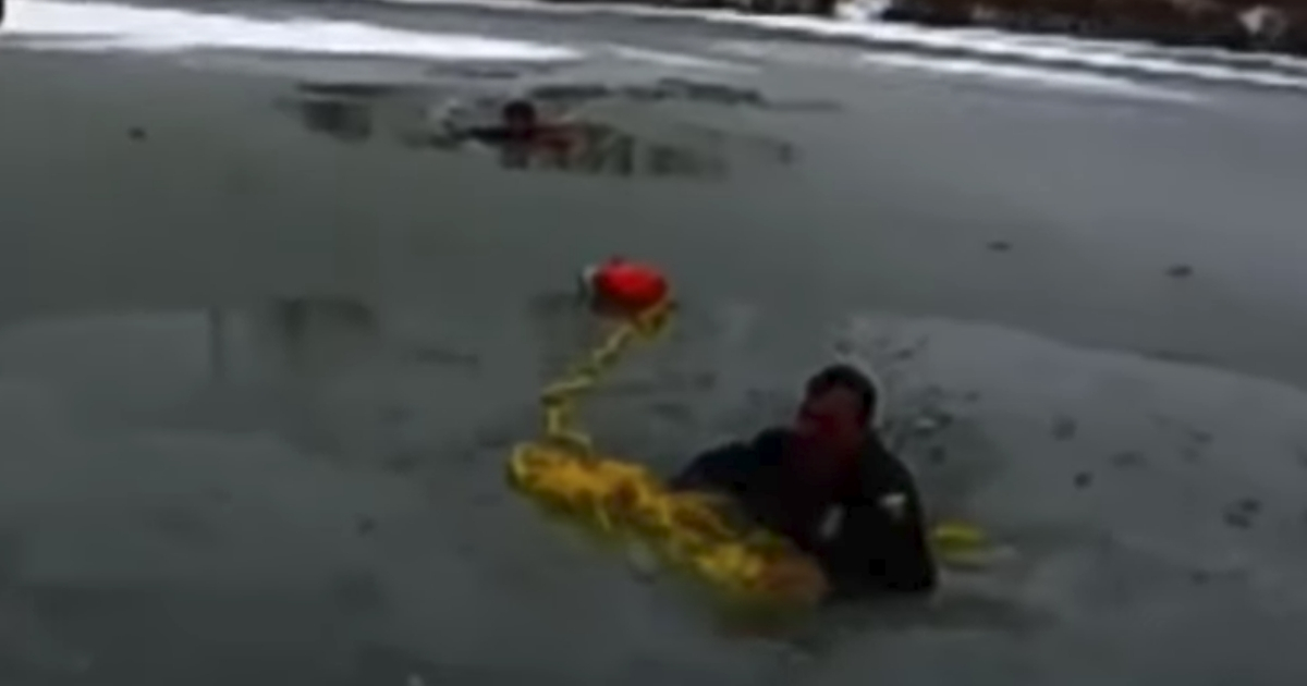 A boy and a police officer fall through the ice