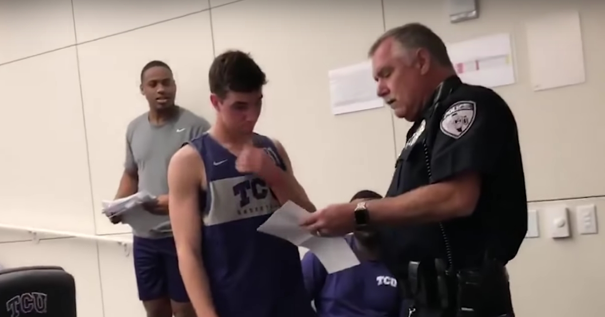 Policeman gives basketball player scholarship