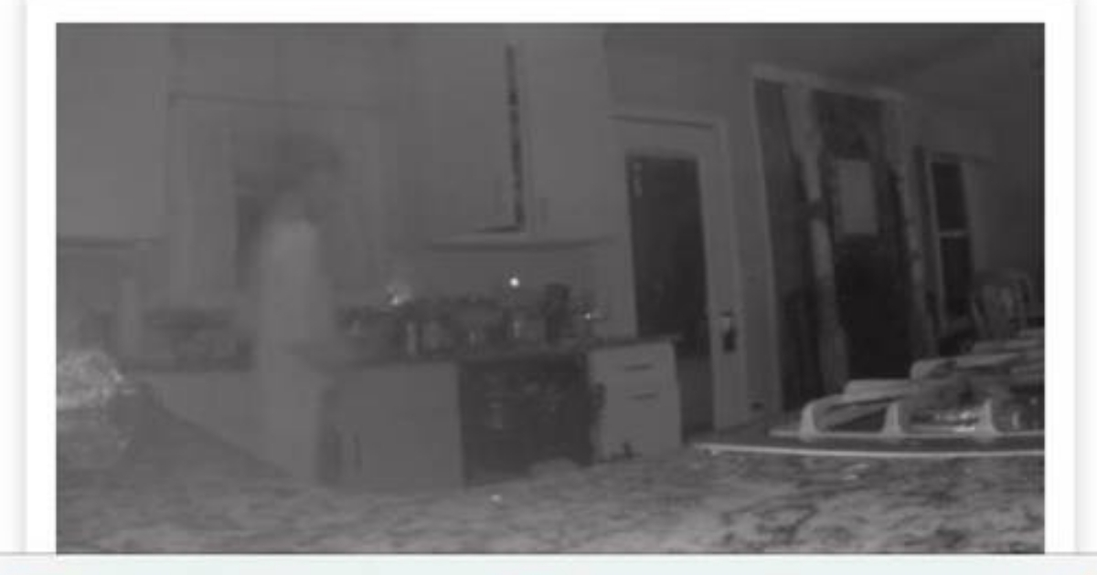 Security camera footage of a kitchen.