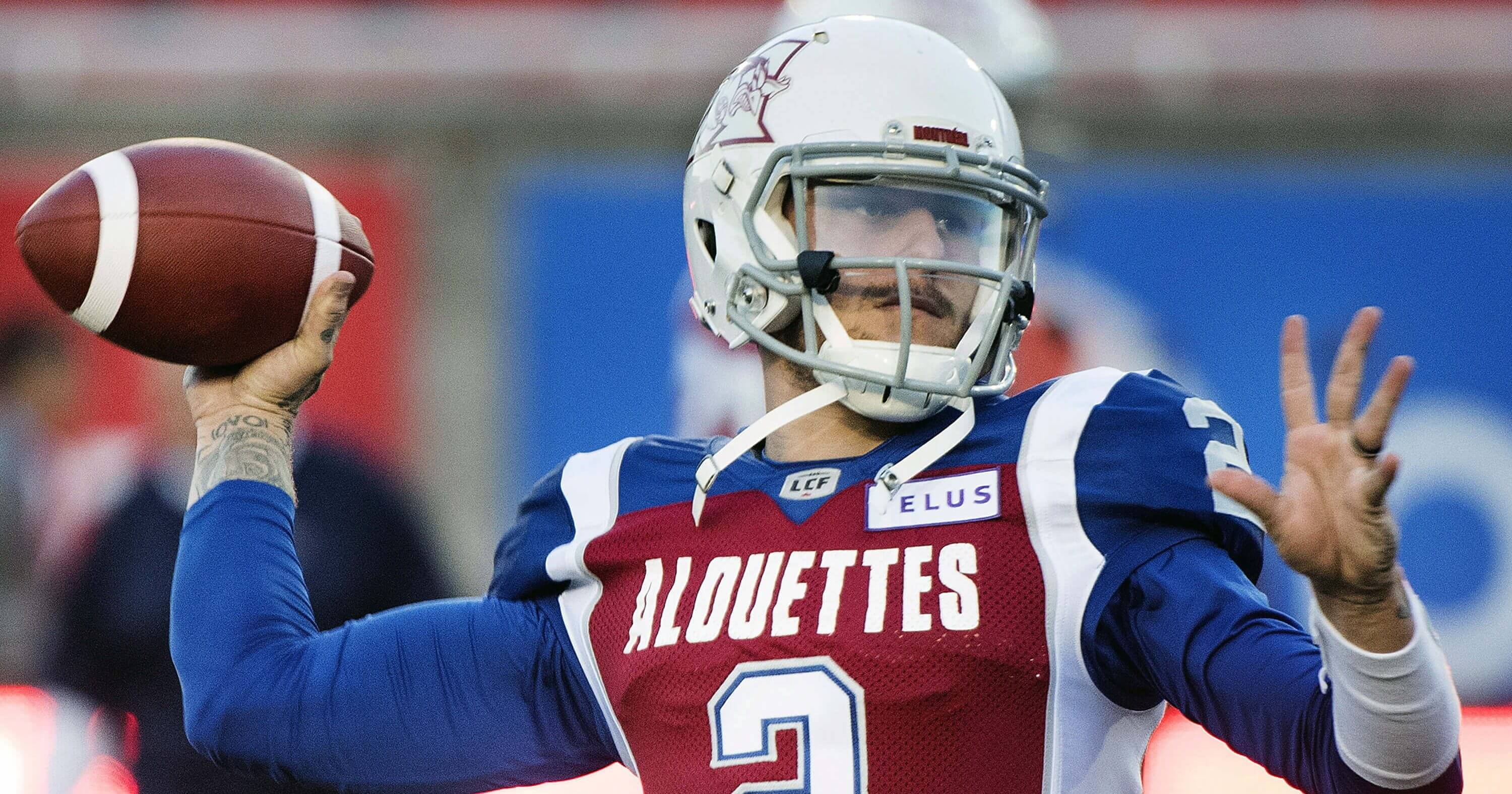 Quarterback Johnny Manziel throws a pass during warmups before the Montreal Alouettes' game against the BC Lions in Montreal on Sept. 14, 2018.