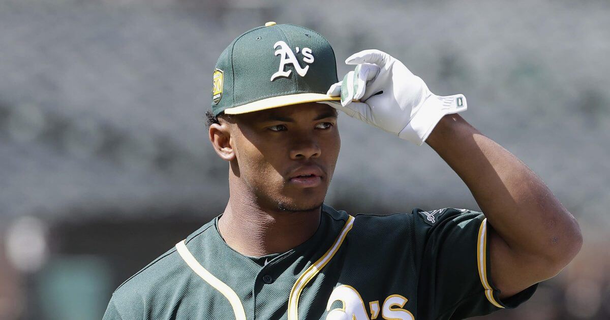 Oakland Athletics draft pick Kyler Murray looks on before a baseball game between the Athletics and the Los Angeles Angels in Oakland in June.