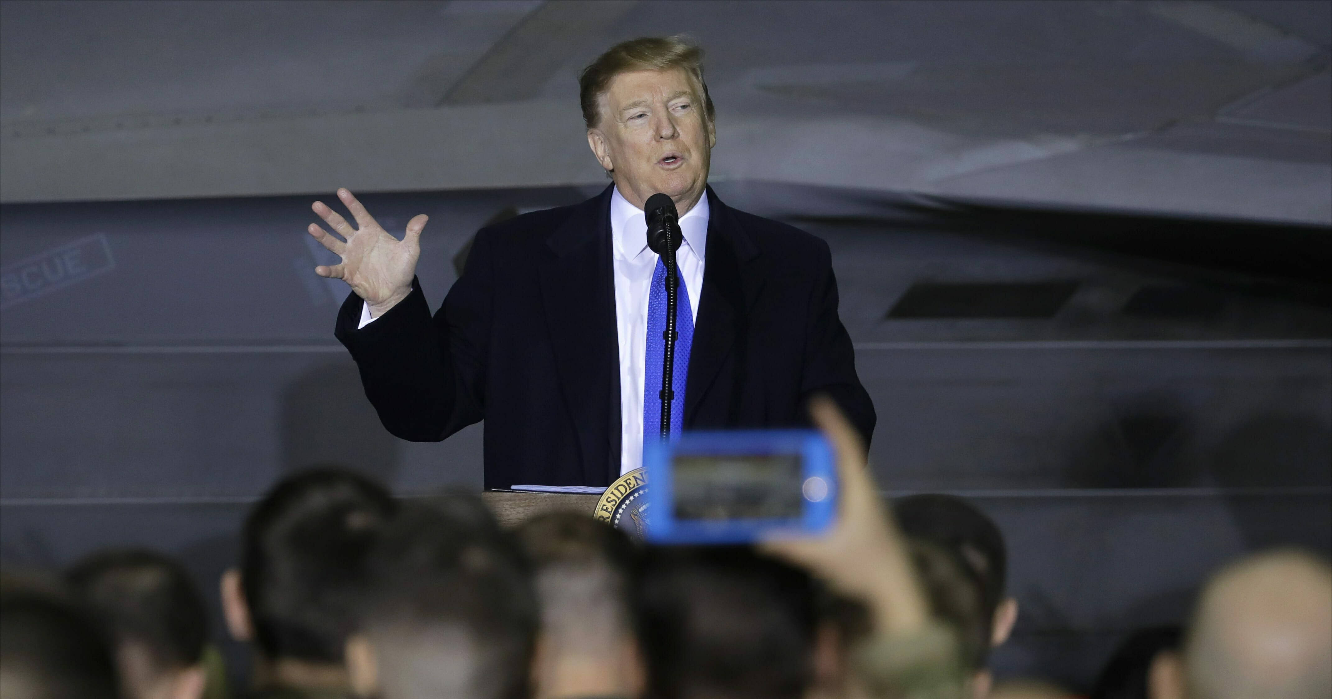 President Donald Trump speaks to service members at Joint Base Elmendorf-Richardson, Thursday, Feb. 28, 2019, in Anchorage, Alaska., during a refueling stop as he returns from Hanoi.