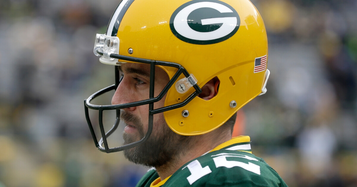 The Green Bay Packers' Aaron Rodgers warms up before a Dec. 30 game against the Detroit Lions at Lambeau Field.