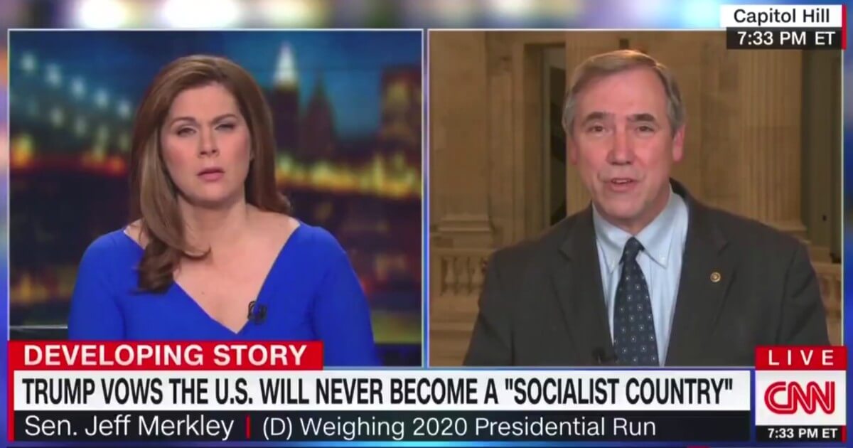 Democrat Sen. Jeff Merkley of Oregon, right, explains socialism to CNN's Erin Burnett.
