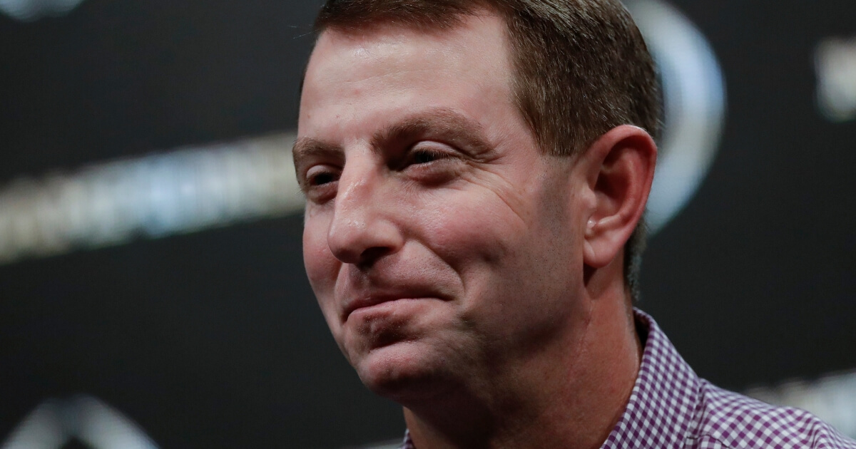 Clemson football coach Dabo Swinney smiles.