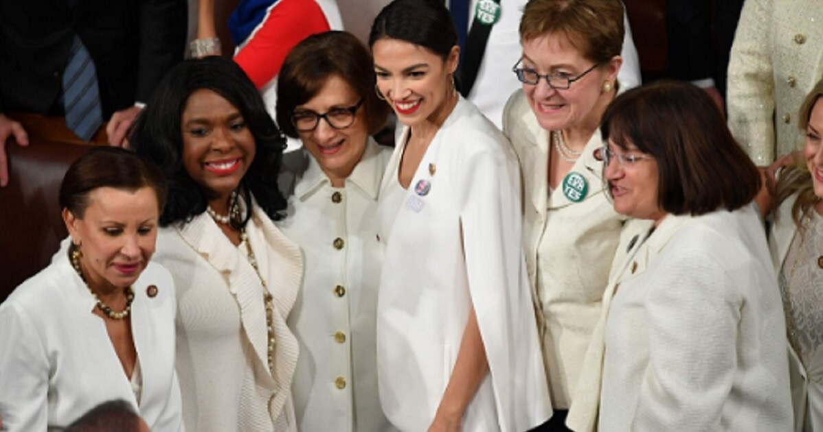 Female Democratic congresswomen, wearing white.