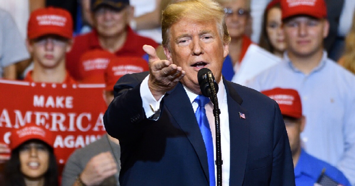 President Donald Trump gestures at a campaign rally in August in Wlkes Barre, Pennsylvania.