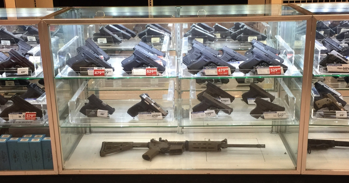 Guns on display in a store.