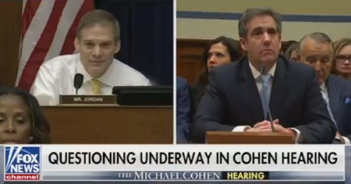 Rep. Jim Jordan, left, grills Michael Cohen, President Donald Trump's former personal attorney, during Cohen's testimony Wednesday before the House Committee on Oversight and Government Reform.