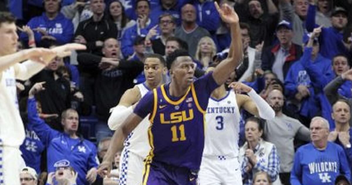 LSU's Kavell Bigby-Williams celebrates after tipping in the game winning shot against Kentucky in NCAA basketball action in Lexington, Kentucky, on Tuesday.