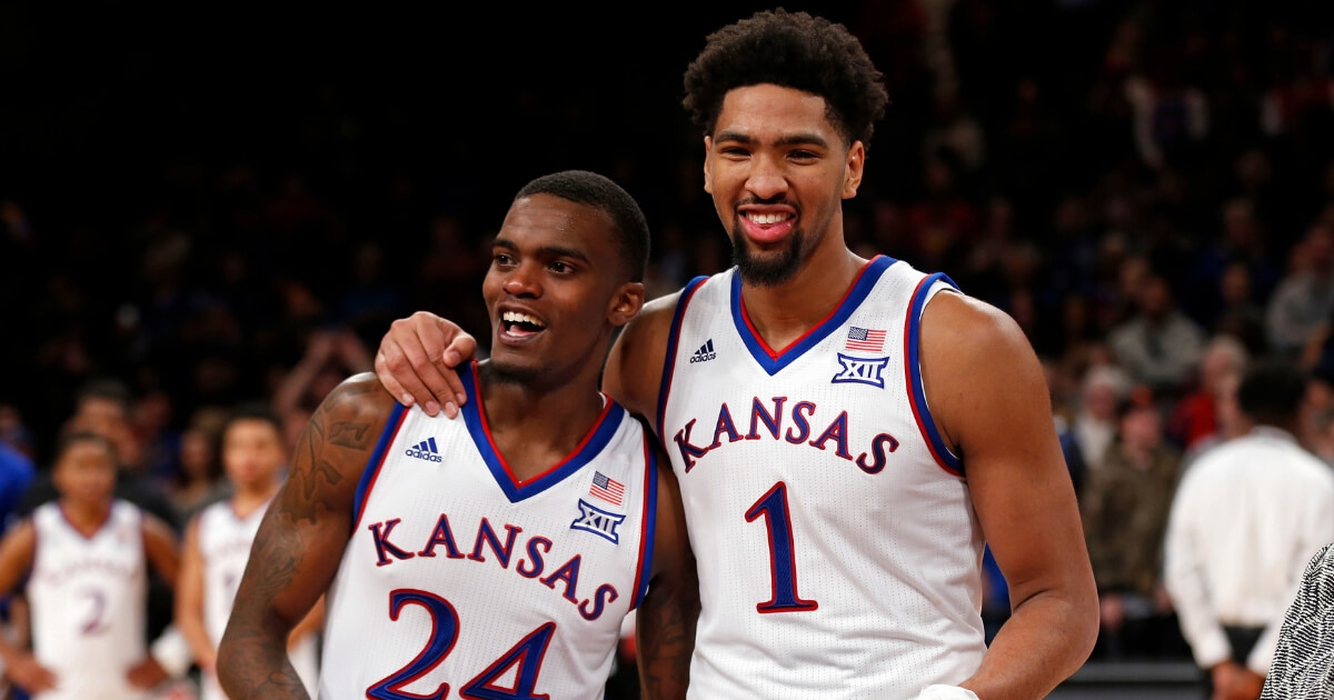 Lagerald Vick, left, and Dedric Lawson of the Kansas Jayhawks smile after defeating Tennessee in in the NIT Season Tip-Off tournament Nov. 24, 2018, in New York.