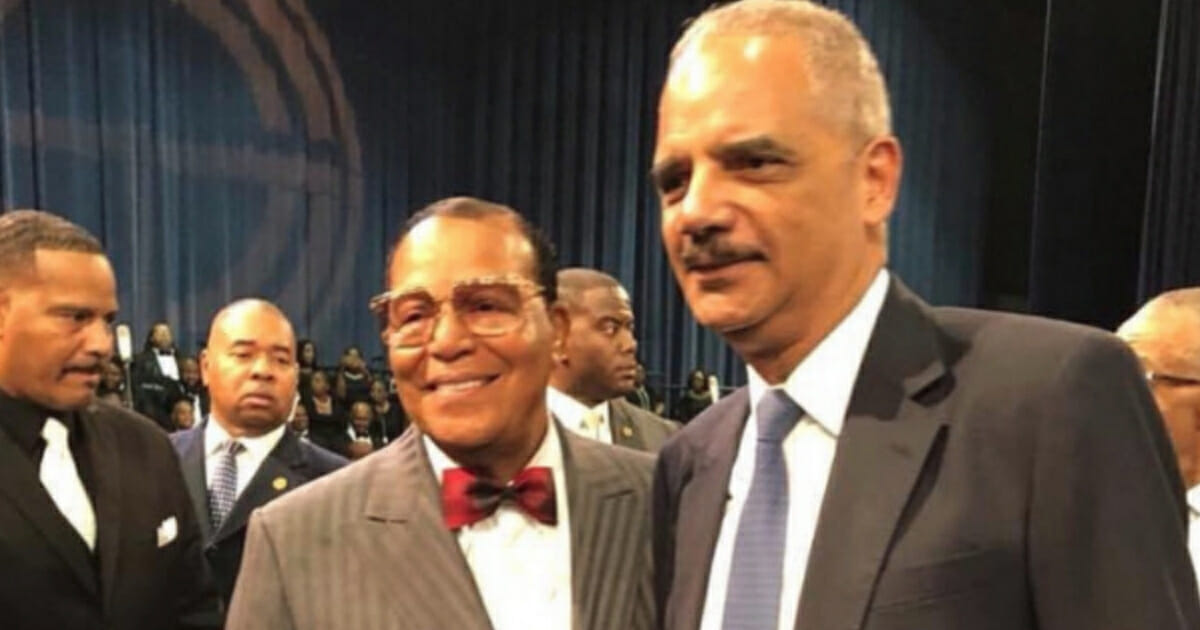 Nation of Islam Minister Louis Farrakhan, left, with former U.S. Attorney General Eric Holder.