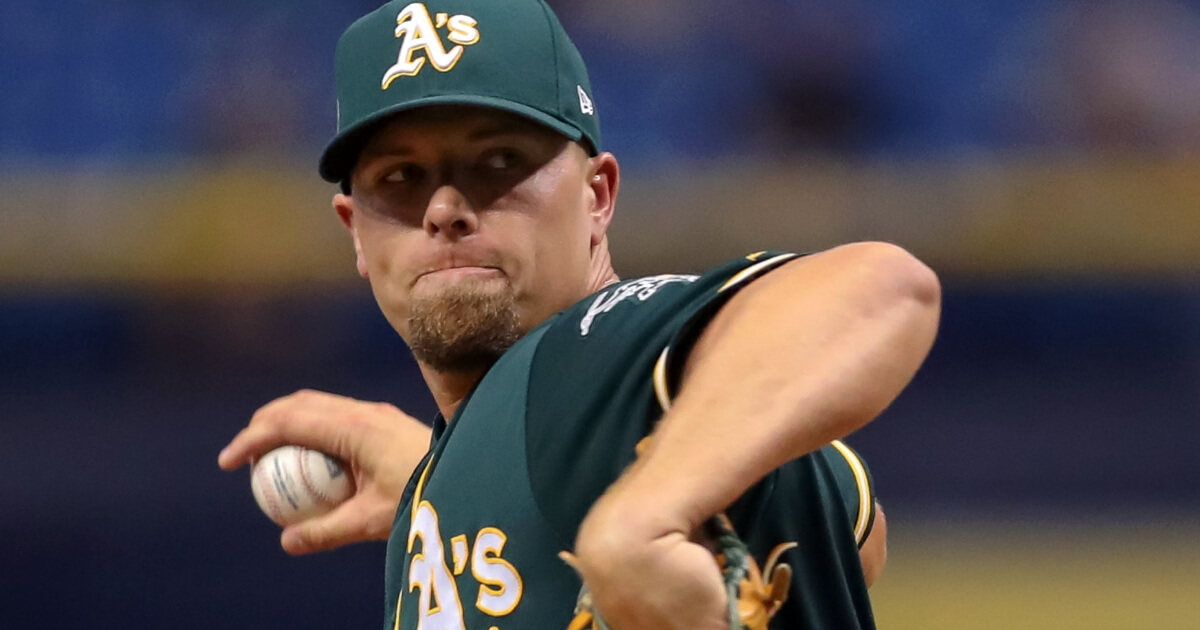 Blake Treinen of the Oakland Athletics throws in the 10th inning of a game against the Tampa Bay Rays at Tropicana Field on Sept. 14, 2018.